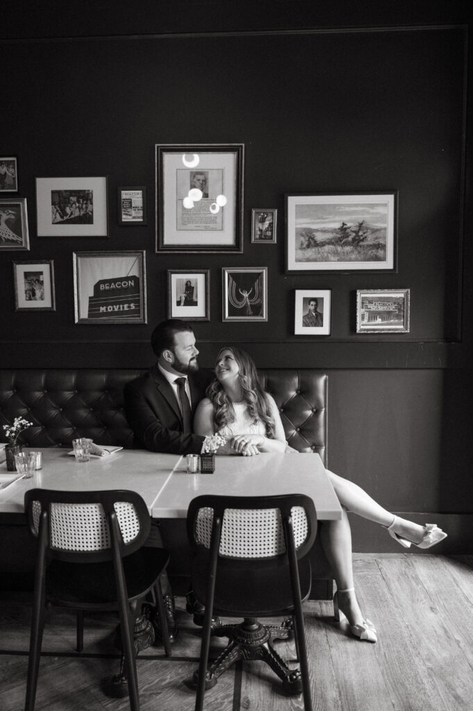 Black and white editorial photo of bride and groom engagement photo
